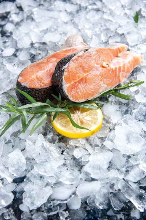Fresh seafood inspected for quality on ice
